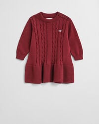 babyjurkje van katoen met kabelbreiwerk - rood met een pluizige afwerking