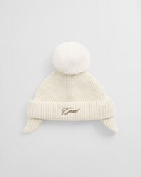 babymutsje met oorklappen en pompon - crème