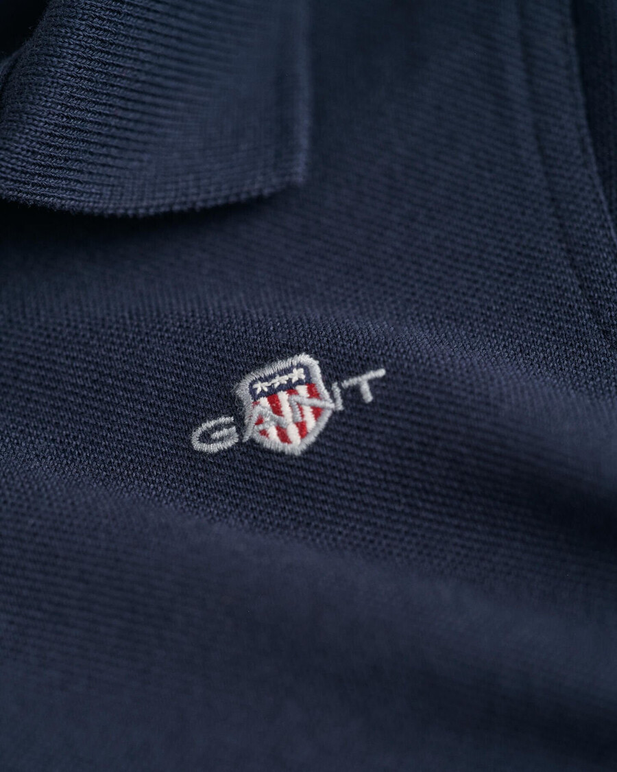 kinderpoloshirt van piqué met schildmotief - avondblauw