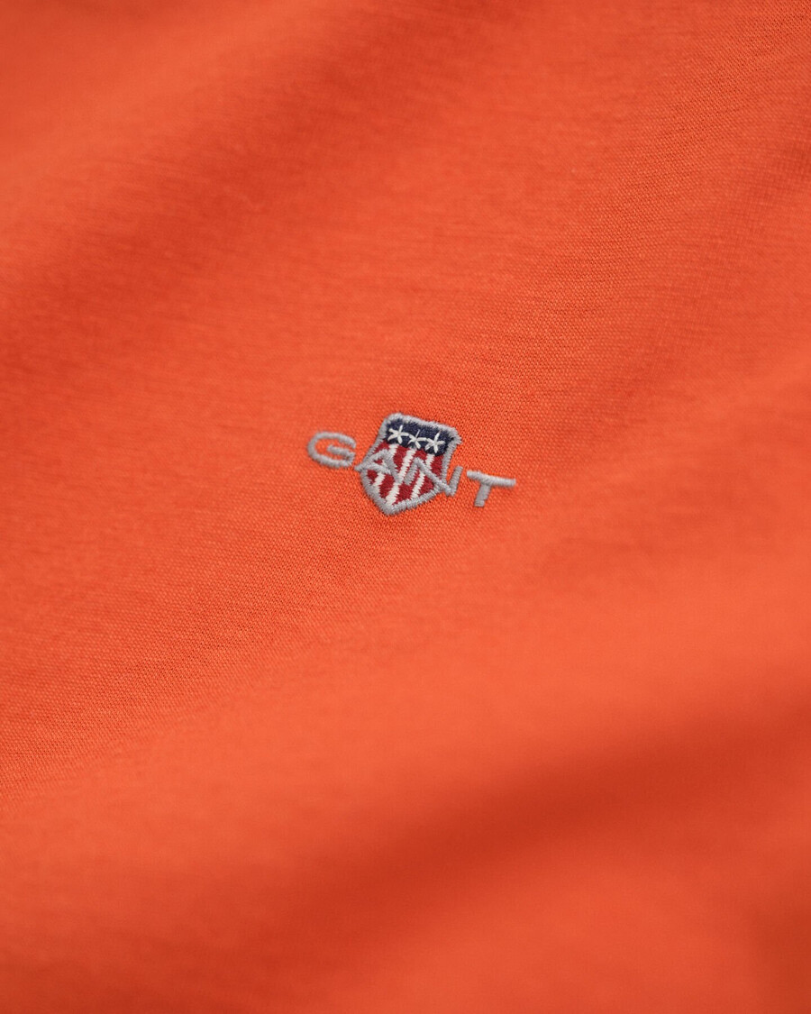 kinder t-shirt met lange mouwen en schildmotief - diep oranje