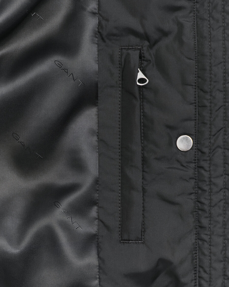 gewatteerde jas met corduroy afwerking - zwart