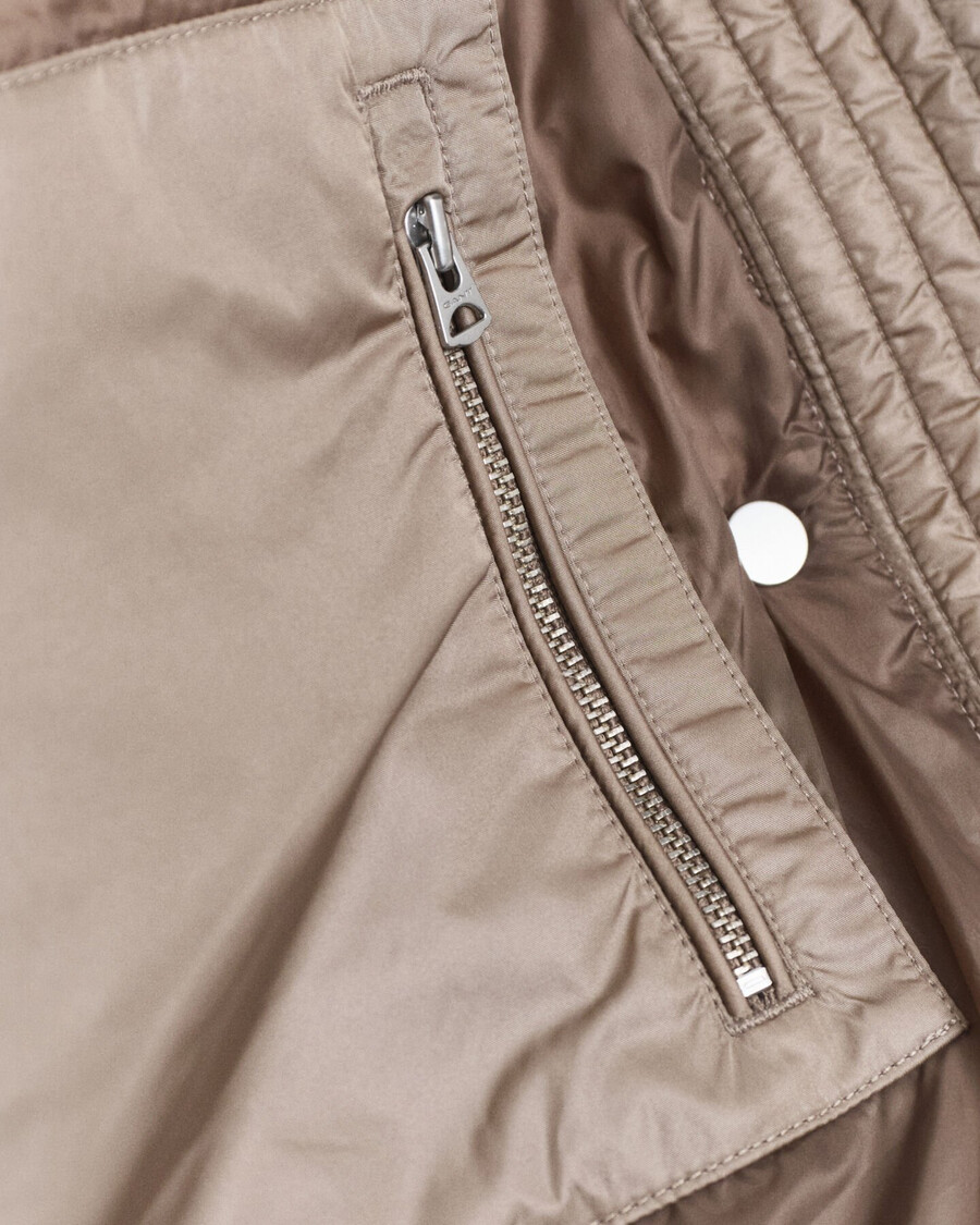 donsjack met relaxte pasvorm - taupebeige